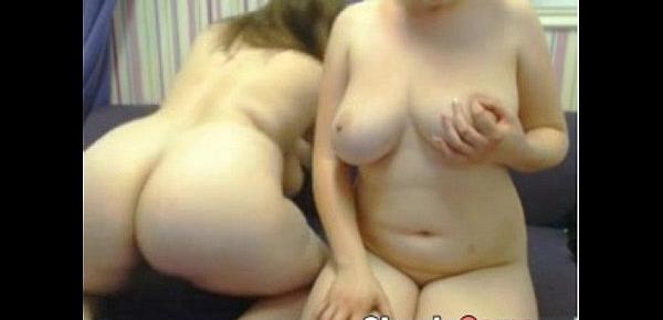  Two busty women rubbing tits on camera